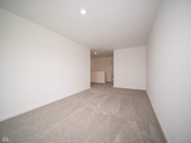7824 Magnolia St, New Palestine, IN 46163 - carpeted empty room featuring recessed lighting and baseboards