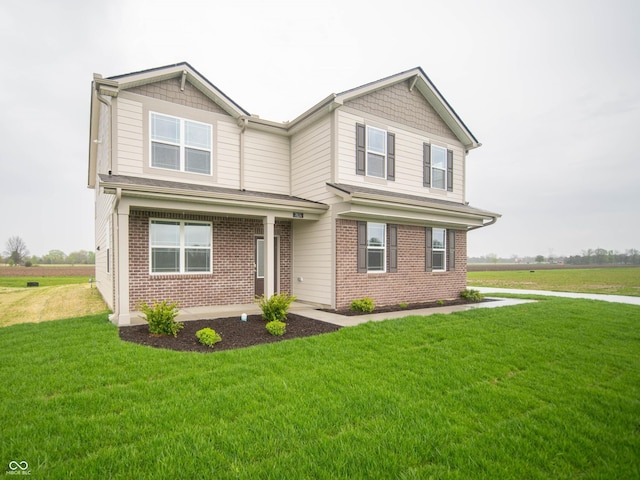 7824 Magnolia St, New Palestine, IN 46163 - view of front of house with brick siding and a front lawn