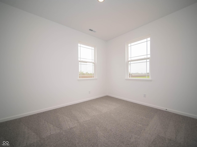 7824 Magnolia St, New Palestine, IN 46163 - carpeted spare room featuring baseboards