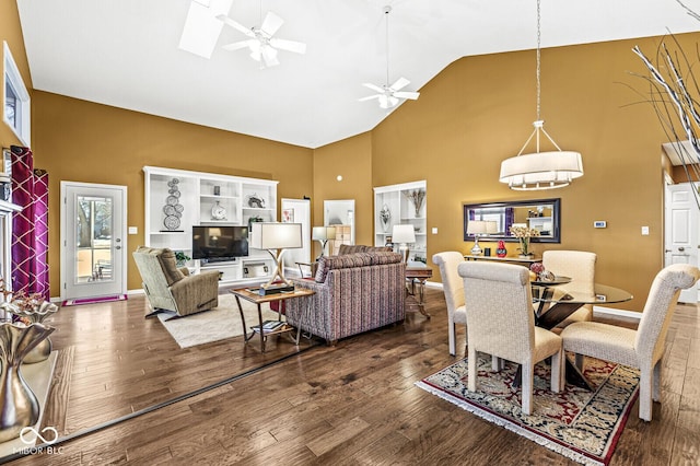 interior space with hardwood / wood-style flooring, high vaulted ceiling, and ceiling fan