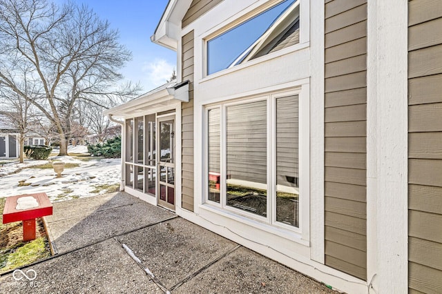 exterior space with a sunroom