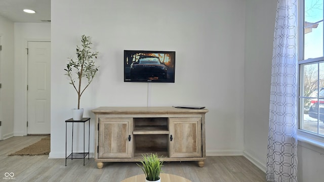 office space with light hardwood / wood-style flooring