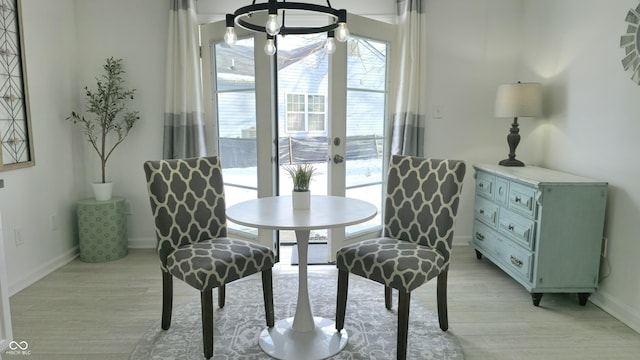 dining room with light hardwood / wood-style flooring