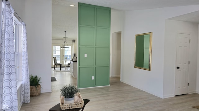 hall featuring light hardwood / wood-style flooring