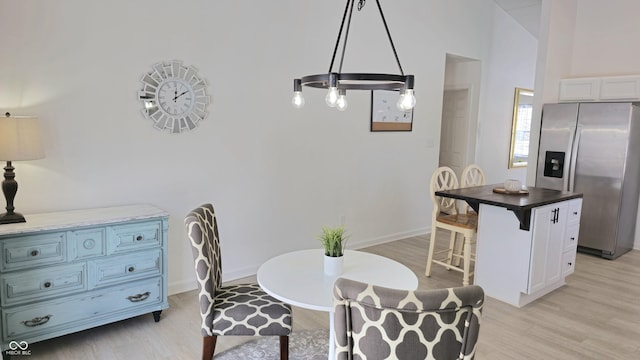 dining room with light wood-type flooring