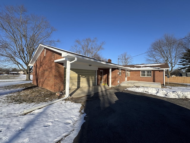 single story home featuring a garage