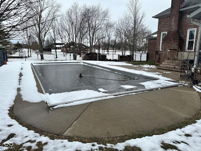 view of yard layered in snow