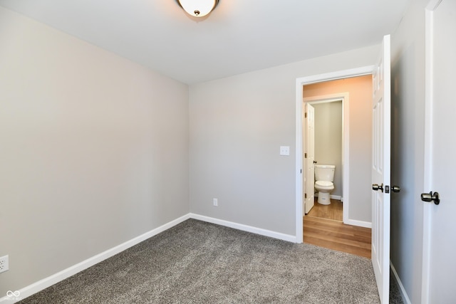 unfurnished bedroom featuring carpet