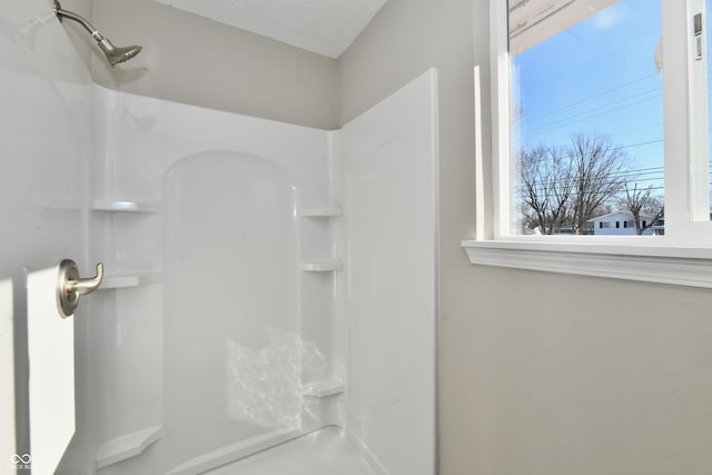 bathroom with walk in shower