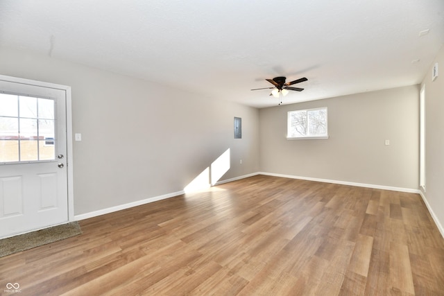 unfurnished room with ceiling fan and light hardwood / wood-style flooring