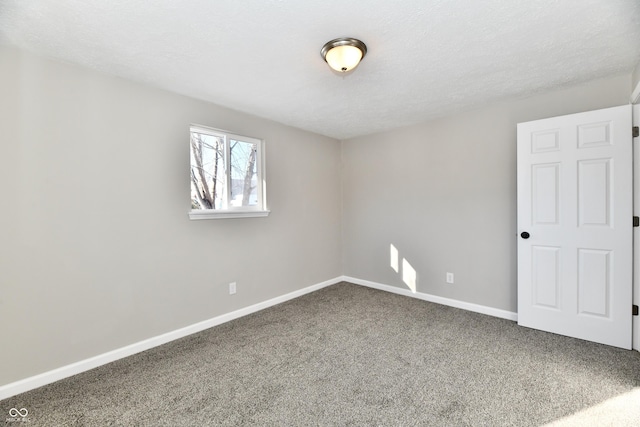 spare room with carpet flooring