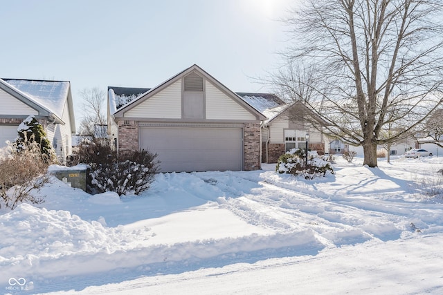 ranch-style house featuring a garage