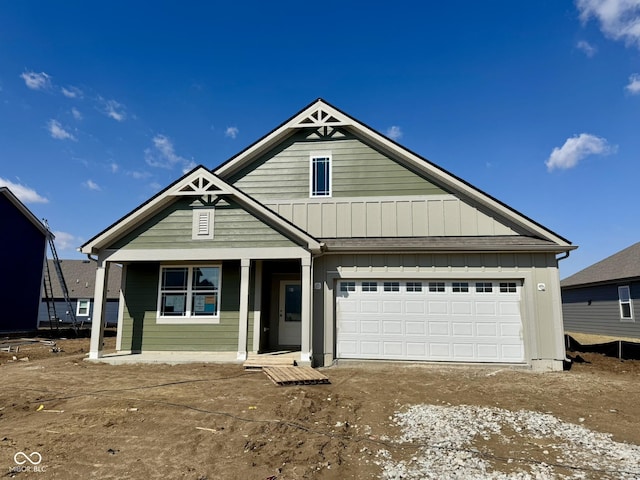 view of front of property with a garage and board and batten siding