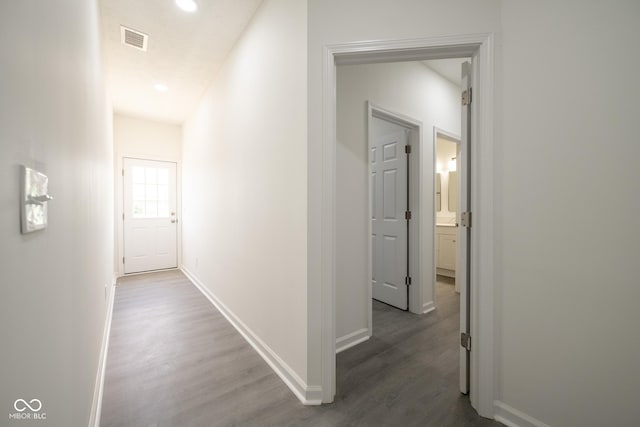 303 Doe Creek Dr, Cloverdale, IN 46120 - hall featuring wood finished floors, baseboards, and recessed lighting
