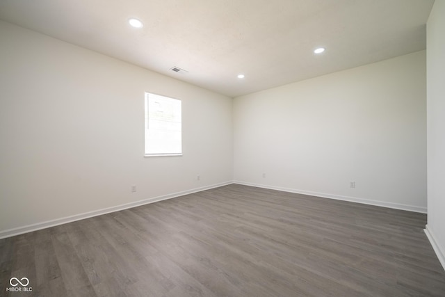 303 Doe Creek Dr, Cloverdale, IN 46120 - empty room featuring recessed lighting, dark wood-type flooring, and baseboards