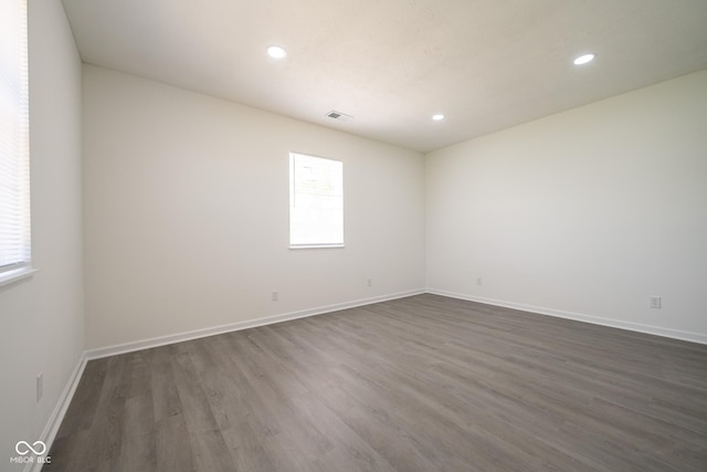 303 Doe Creek Dr, Cloverdale, IN 46120 - unfurnished room featuring dark wood-style flooring, recessed lighting, and baseboards
