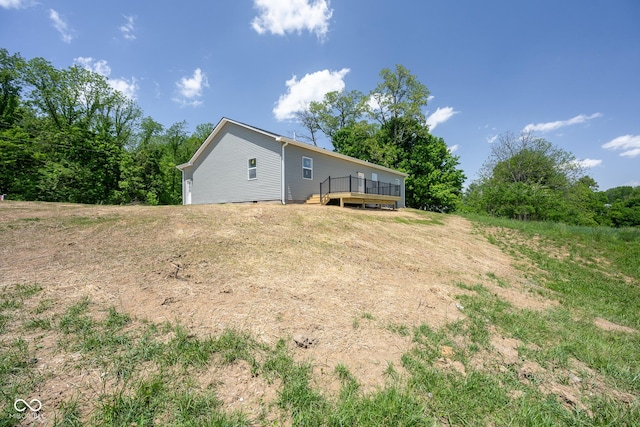 303 Doe Creek Dr, Cloverdale, IN 46120 - rear view of house with a wooden deck