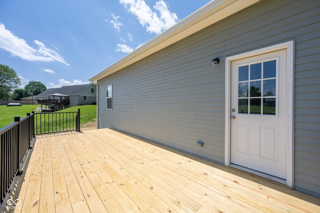 303 Doe Creek Dr, Cloverdale, IN 46120 - wooden deck with a yard