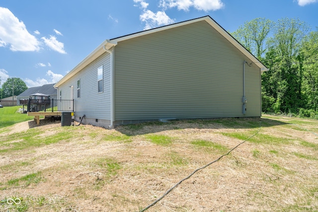 303 Doe Creek Dr, Cloverdale, IN 46120 - view of side of home featuring a wooden deck and cooling unit