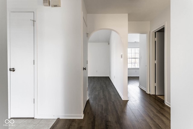 hall featuring dark wood-type flooring