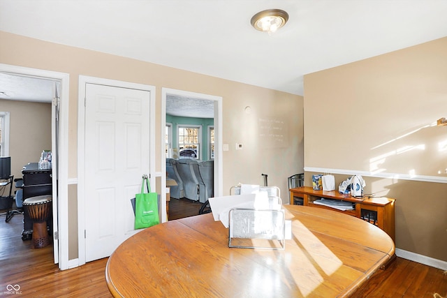 2934 S Irwin St, Indianapolis, IN 46203 - dining area featuring wood finished floors, baseboards, and an office area