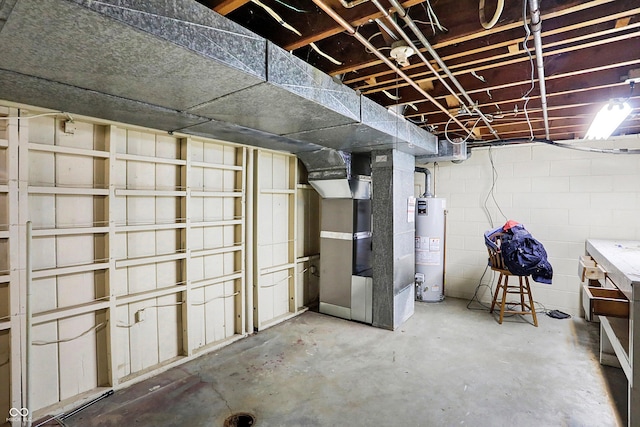 2934 S Irwin St, Indianapolis, IN 46203 - unfinished basement featuring gas water heater, heating unit, and concrete block wall