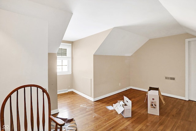2934 S Irwin St, Indianapolis, IN 46203 - bonus room with wood finished floors, vaulted ceiling, and baseboards