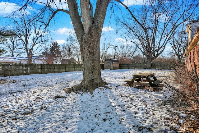 2934 S Irwin St, Indianapolis, IN 46203 - yard covered in snow with a fenced backyard