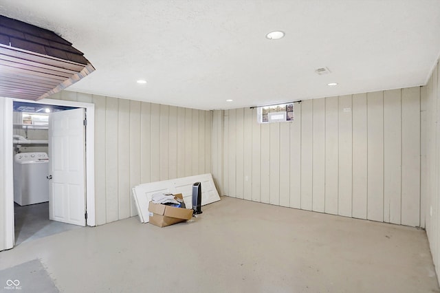 2934 S Irwin St, Indianapolis, IN 46203 - below grade area featuring washer / dryer, recessed lighting, and wooden walls