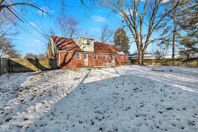 2934 S Irwin St, Indianapolis, IN 46203 - snow covered rear of property with brick siding