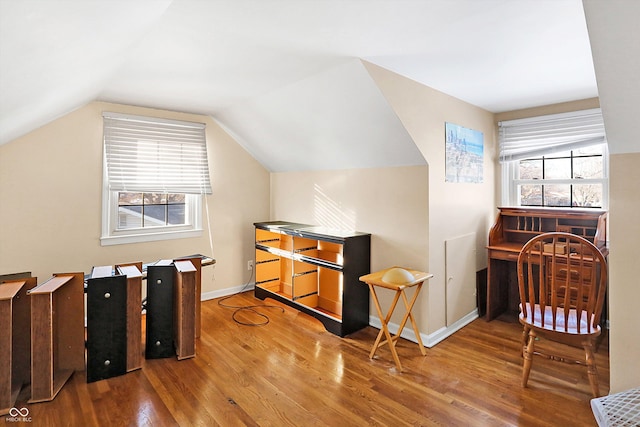 2934 S Irwin St, Indianapolis, IN 46203 - additional living space with wood finished floors, vaulted ceiling, and baseboards