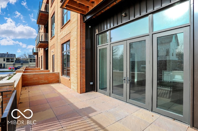 view of patio featuring french doors