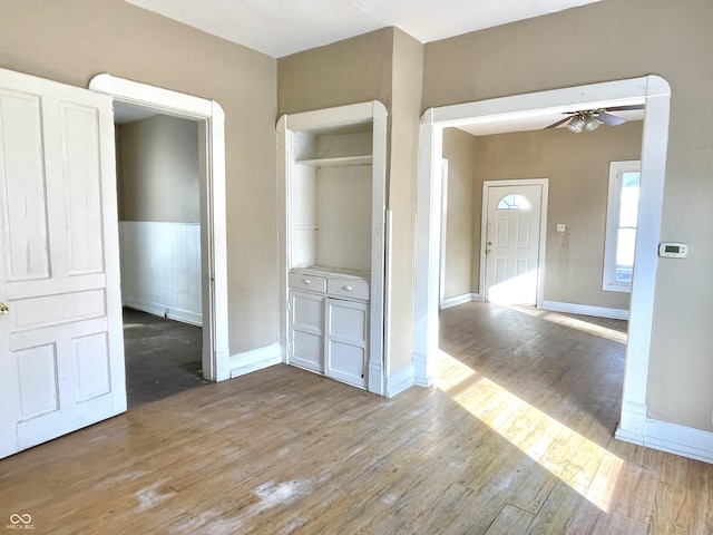 interior space featuring ceiling fan and light wood-type flooring