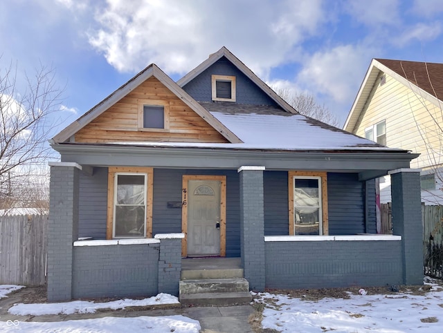 bungalow-style house featuring covered porch