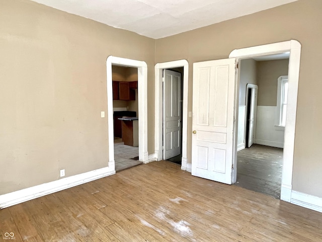 unfurnished bedroom featuring light hardwood / wood-style flooring