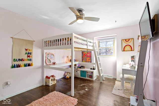 bedroom featuring ceiling fan and dark hardwood / wood-style flooring