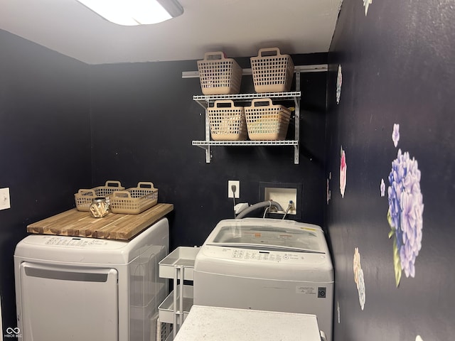 washroom with independent washer and dryer