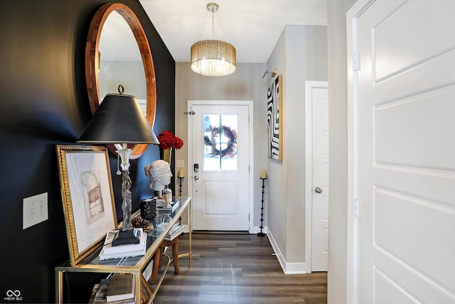 entrance foyer featuring dark hardwood / wood-style floors