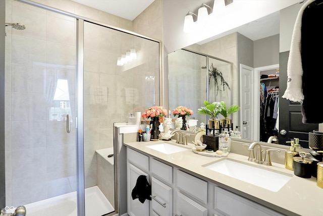 bathroom with vanity and an enclosed shower