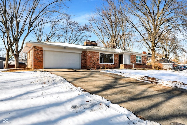 single story home featuring a garage