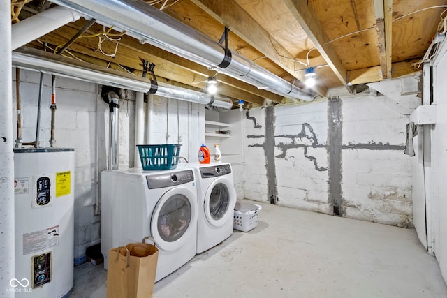 washroom featuring separate washer and dryer and water heater