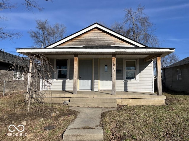 1610 Hoefgen St, Indianapolis, IN 46203 - bungalow-style home featuring a porch