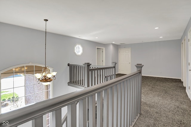 386 White Oak Ln, Greenwood, IN 46142 - hallway with an inviting chandelier, an upstairs landing, carpet floors, baseboards, and recessed lighting