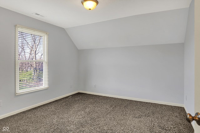 386 White Oak Ln, Greenwood, IN 46142 - bonus room featuring lofted ceiling, carpet, baseboards, and visible vents
