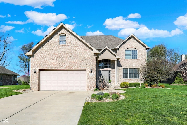 386 White Oak Ln, Greenwood, IN 46142 - traditional-style home with concrete driveway, brick siding, and a front lawn