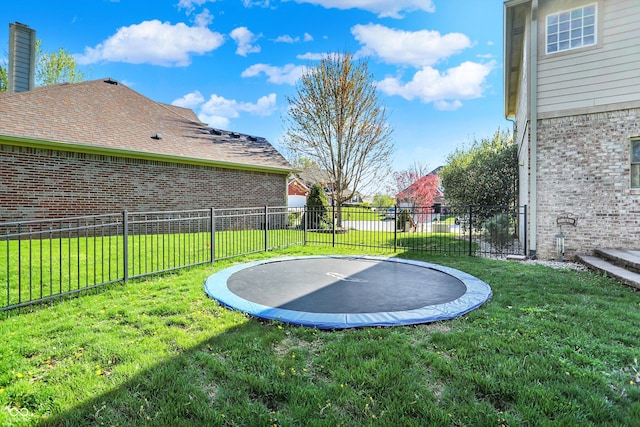 386 White Oak Ln, Greenwood, IN 46142 - view of yard featuring a trampoline and fence