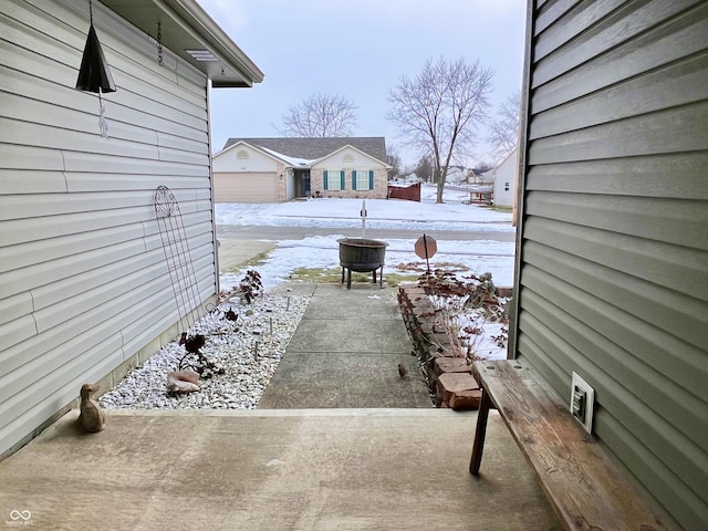 view of snow covered patio