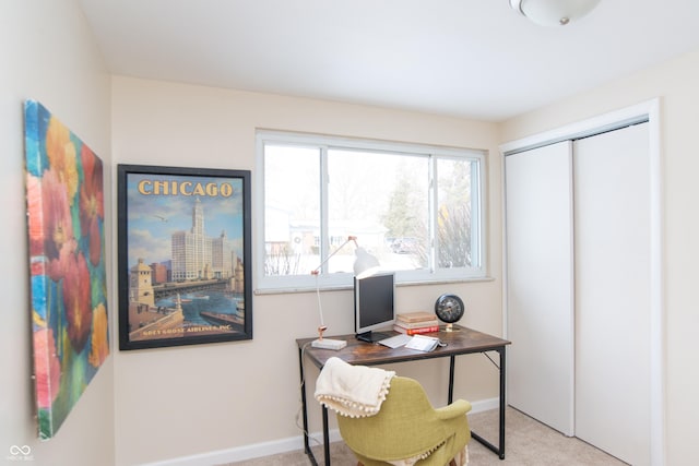 carpeted home office with a wealth of natural light