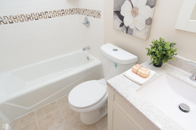 full bathroom with washtub / shower combination, toilet, tile patterned floors, and vanity