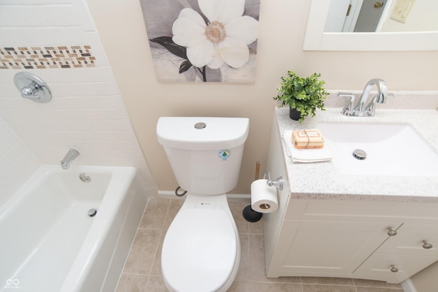 bathroom with toilet, tile patterned flooring, and vanity